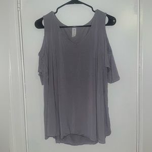 Cold shoulder short sleeve v neck shirt.